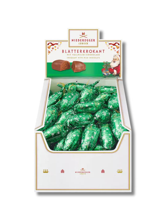 Niederegger Weihnachts-Schmuck Blätterkrokant Zapfen 17 g – einzelner Schokoladenzapfen aus Blätterkrokant mit Vollmilchschokolade, erhältlich bei Dreyer Confiserie Hameln.
