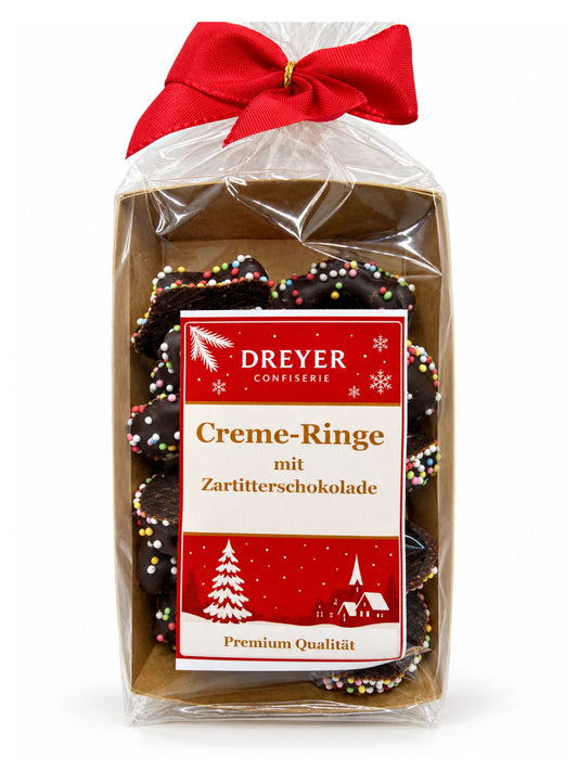 Creme-Ringe mit Zartbitterschokolade 125g von Dreyer Confiserie mit bunten Zuckerperlen

