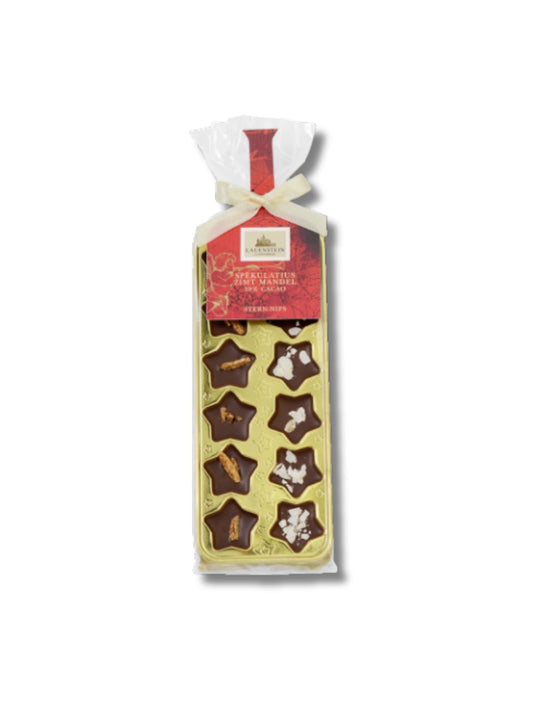 Lauensteiner Stern-Nips Spekulatius & Zimt-Mandel 30 g – kleine Sterne aus Edel-Vollmilchschokolade mit Zimt, Mandeln und Spekulatius-Gewürz, weihnachtliche Spezialität bei Dreyer Confiserie in Hameln.