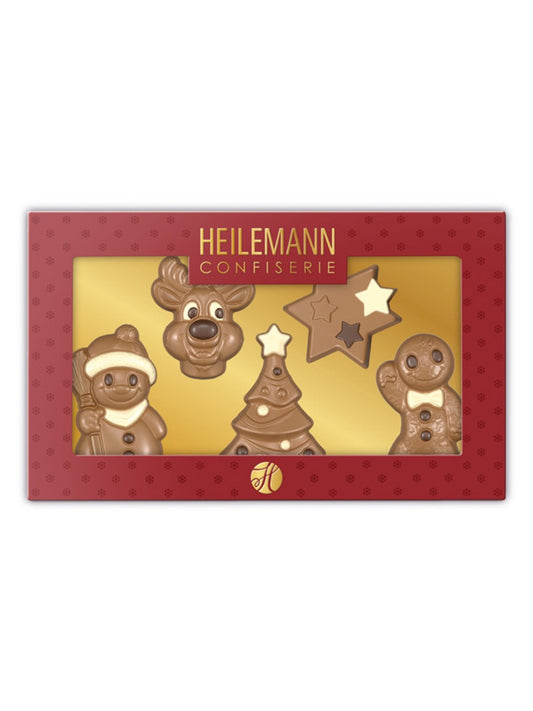 Geschenkpackung „Weihnachtsfiguren“ 100 g – fünf liebevoll dekorierte Figuren aus Edelvollmilch-Schokolade, ideal als Geschenk oder für den Weihnachtsteller, erhältlich in der Dreyer Confiserie in der Rattenfängerstadt Hameln.