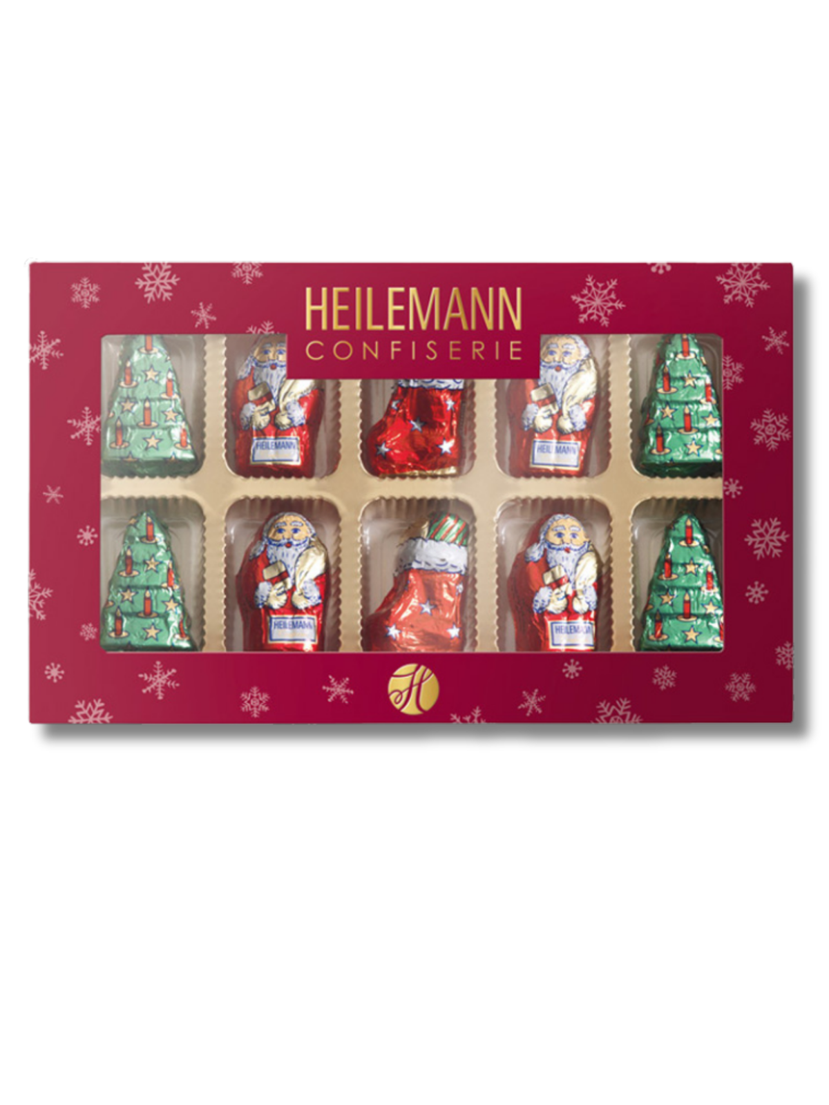 Heilemann Geschenkpackung „Merry Christmas“ 100 g – zehn liebevoll gestaltete Weihnachtsfiguren aus Edelvollmilch-Schokolade in Schneeflocken-Verpackung, erhältlich in der Dreyer Confiserie in der Rattenfängerstadt Hameln.