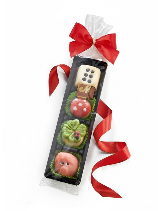 Odenwälder Marzipan-Glücksstange 60g: vier kleine Marzipan-Glücksbringer (Schweinchen, Kleeblatt, Glückspilz, Würfel) aus Edelmarzipan, ideal zum Verschenken zum Jahreswechsel und Silvester, erhältlich in der Dreyer Confiserie in der Rattenfängerstadt Hameln.