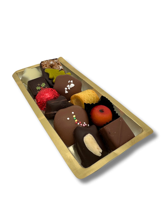 Produktbild von Confiserie Rabbel Adventsmischung 125 g – festliche Auswahl aus handgefertigten Gebäck- und Pralinenspezialitäten, erhältlich in der Dreyer Confiserie in der Rattenfängerstadt Hameln.