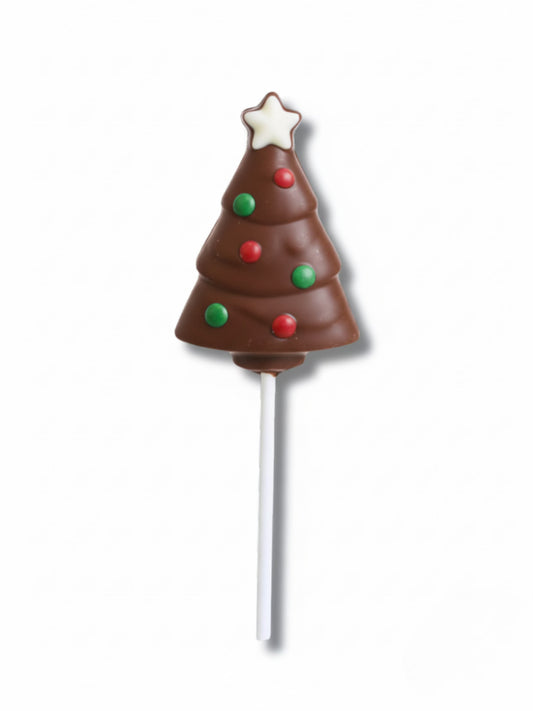 Schokoladen Weihnachts Lolli „Baum“ Vollmilch 30g – weihnachtlicher Schokoladen-Lolli in Tannenbaumform aus Vollmilchschokolade mit farbiger Dekoration, erhältlich in der Dreyer Confiserie in der Rattenfängerstadt Hameln.
