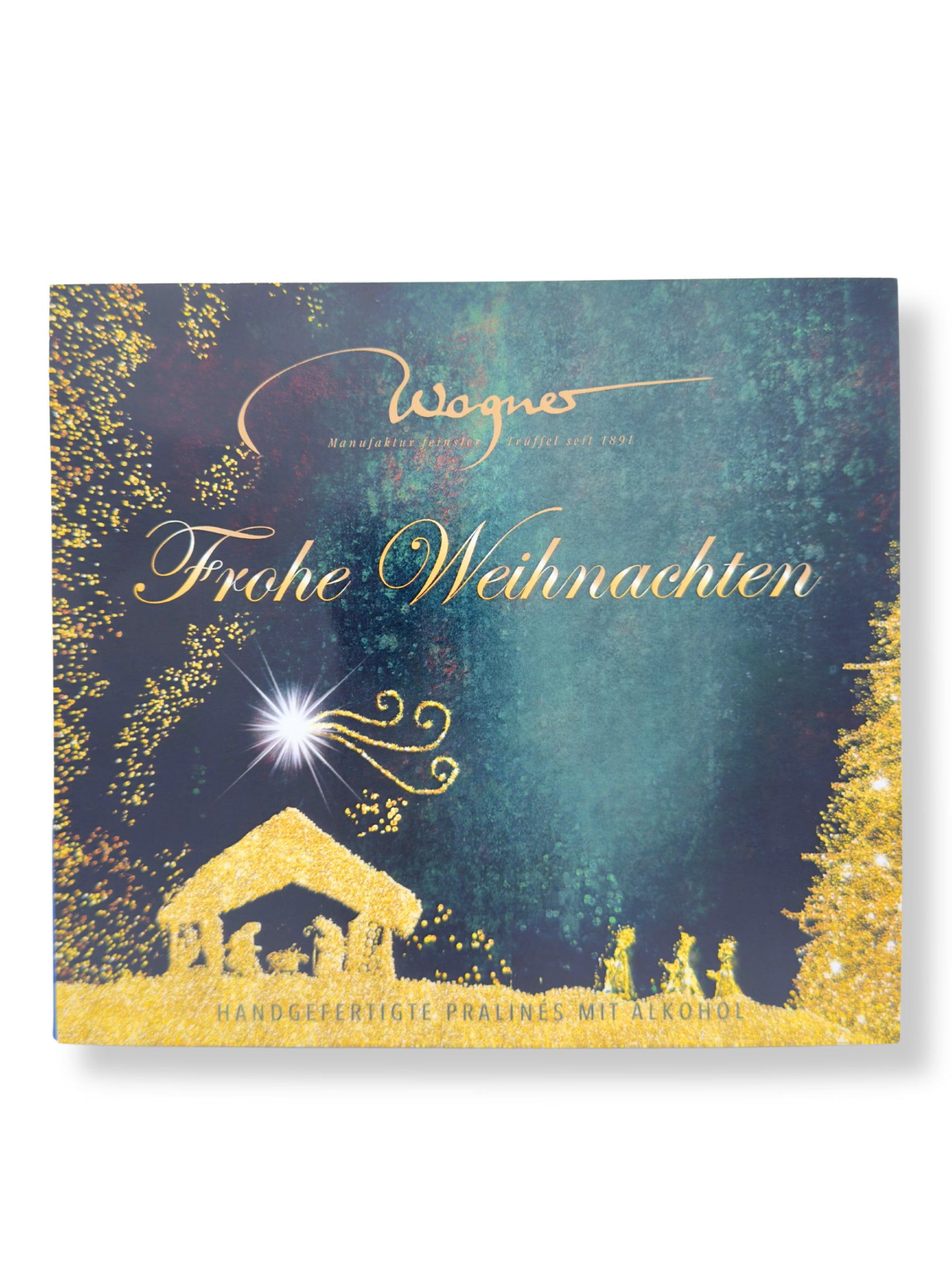 Wagner Trüffelpralinés „Frohe Weihnachten“ 100 g – edle Pralinenmischung mit feinen Trüffeln und Likören, handgefertigt von der Wagner Pralinenmanufaktur, erhältlich in der Dreyer Confiserie in der Rattenfängerstadt Hameln.