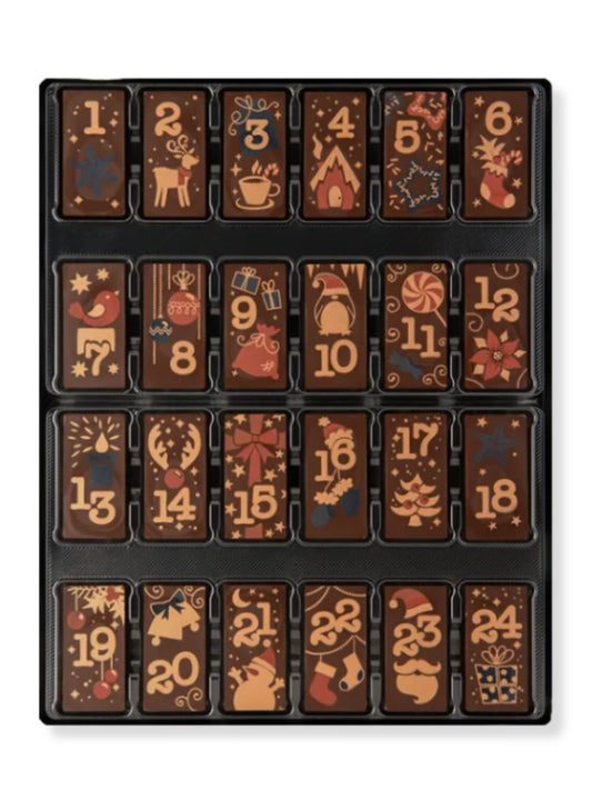 Adventskalender Zartbitter 200 g – Kalender mit 24 dekorierten Täfelchen aus kräftiger Zartbitterschokolade, erhältlich in der Dreyer Confiserie in der Rattenfängerstadt Hameln.