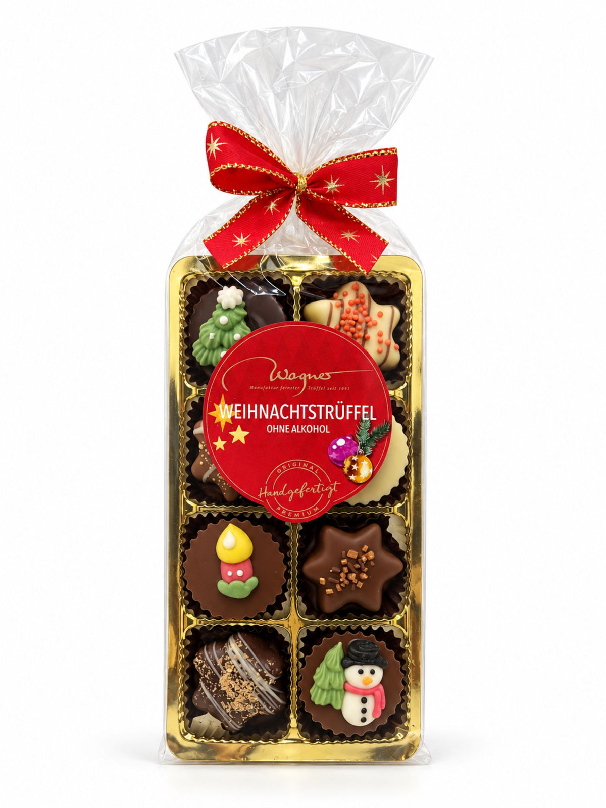 Weihnachtstrüffel ohne Alkohol 110g von Wagner Pralinen mit acht festlich dekorierten Schokoladenpralinen in goldfarbener Geschenkverpackung mit roter Schleife