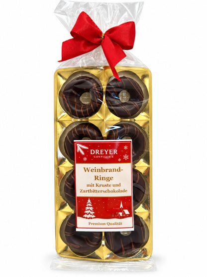 Weinbrand-Ringe 100g von Dreyer Confiserie mit Zartbitterschokolade in festlicher Verpackung